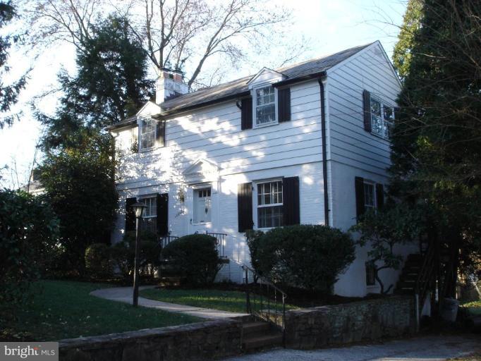 1205 Lake Falls Road Baltimore, MD 21210 - Photo 1 of 20 Front lawn is screened by lovely hedge,