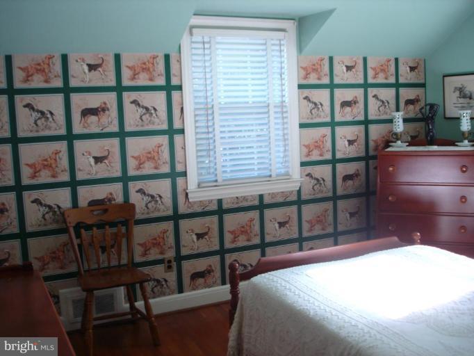 1205 Lake Falls Road Baltimore, MD 21210 - Photo 11 of 20 BR2 offers hdwd floor, closet + cedar closet.