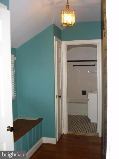 1205 Lake Falls Road Baltimore, MD 21210 - Photo 14 of 20 2nd fl hall 8x9. Hdwd, bench, 2 linen closets