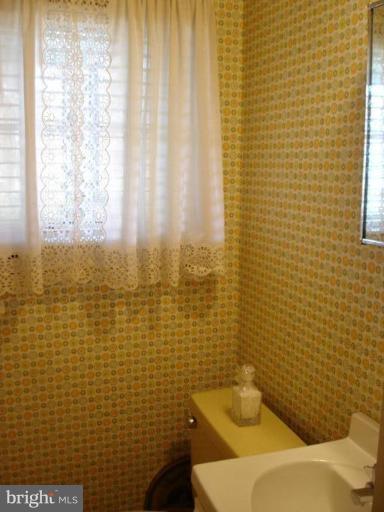 1205 Lake Falls Road Baltimore, MD 21210 - Photo 20 of 20 Powder Rm is adjacent to kitchen