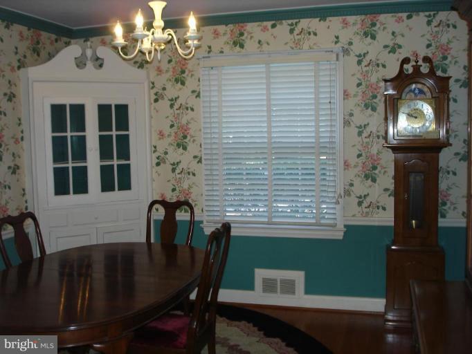 1205 Lake Falls Road Baltimore, MD 21210 - Photo 4 of 20 Dining Rm offers dental molding & chair rail