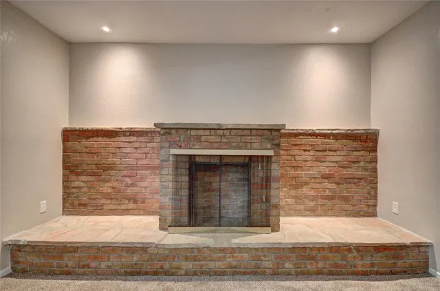 a view of fireplace and utility room