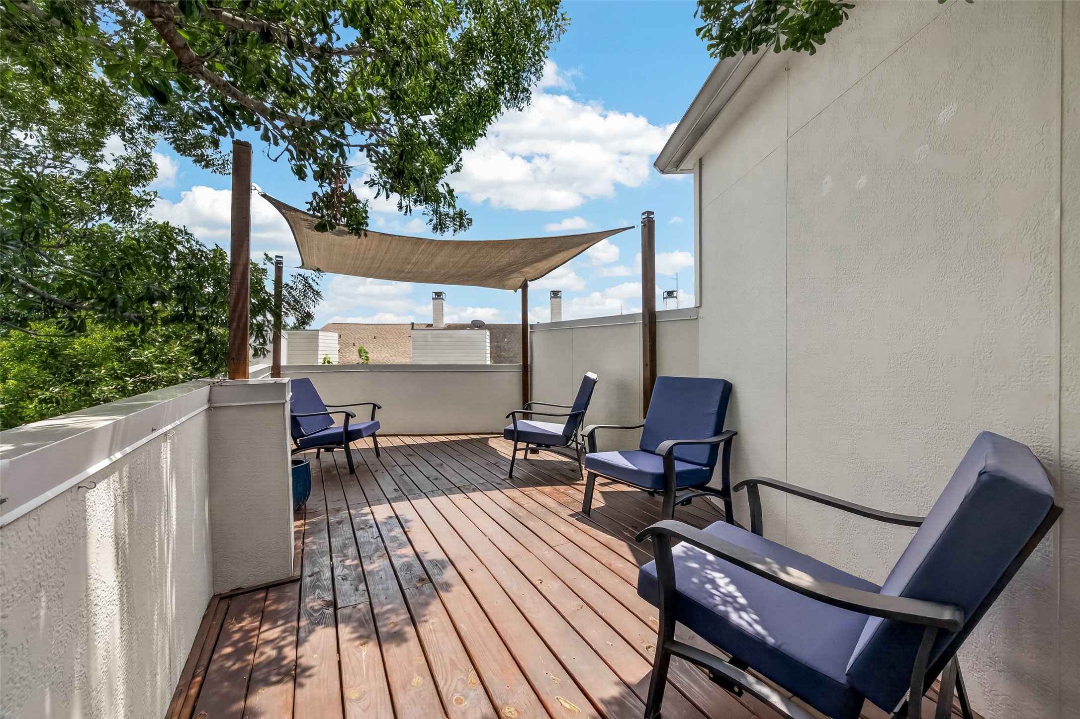 1767 Michigan Street Houston, TX 77006 - Photo 30 of 33 The second rooftop deck is shaded by a sail canopy.