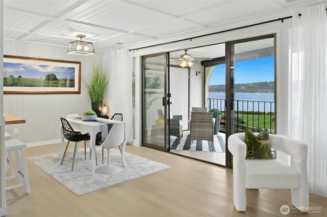 a bathroom with a bathtub sink and mirror