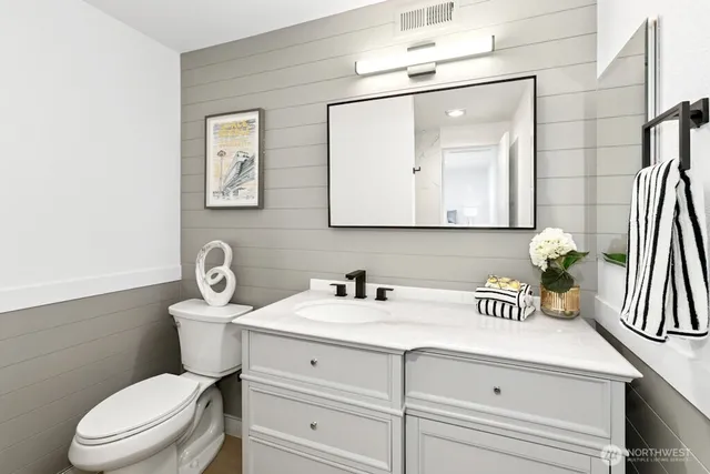 a view of swimming pool with a lake view