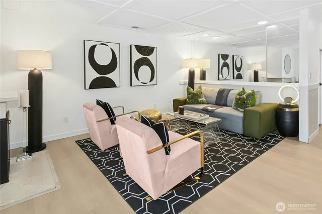 a balcony with furniture and a floor to ceiling window