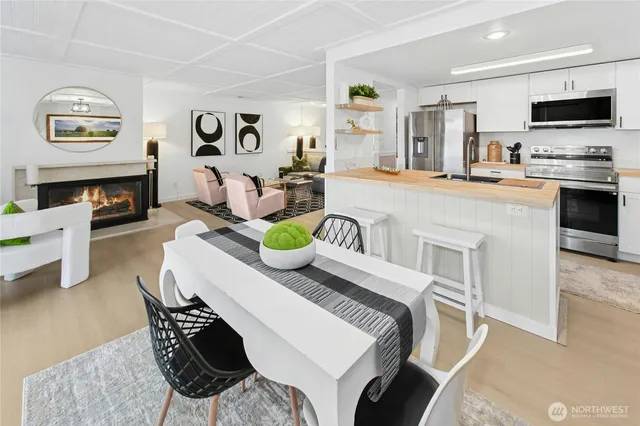 a spacious bedroom with a bed and a lamp