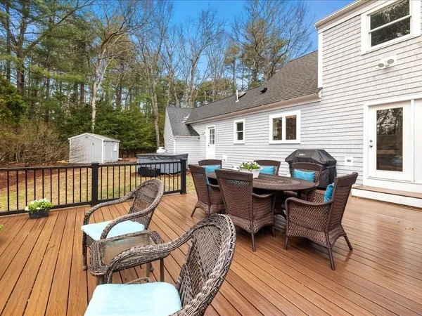 a view of a house with patio and wooden floor