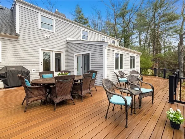 a backyard of a house with large trees