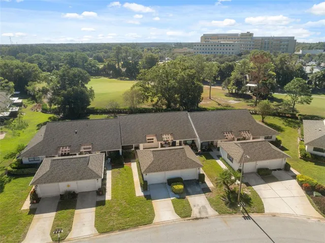 an aerial view of a house with a garden