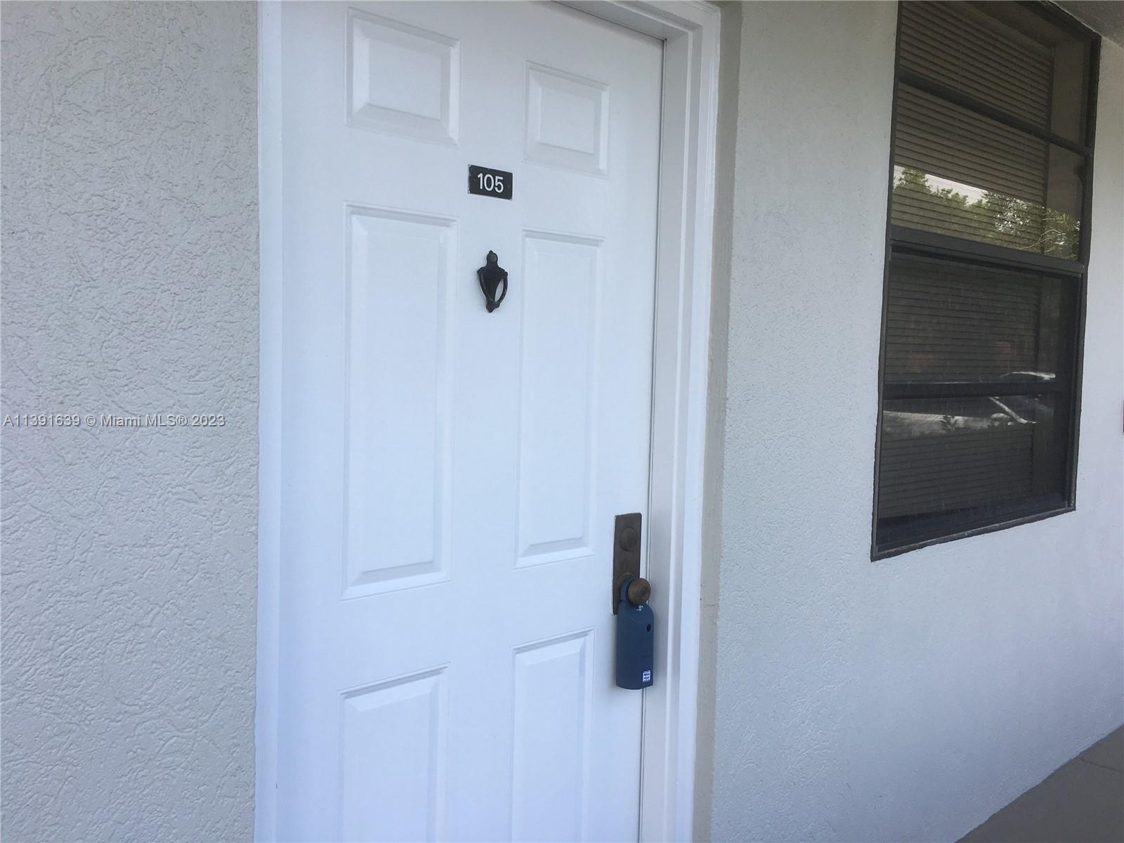 1719 Whitehall Drive, Unit 105 Davie, FL 33324 - Photo 1 of 10 a bathroom with a shower