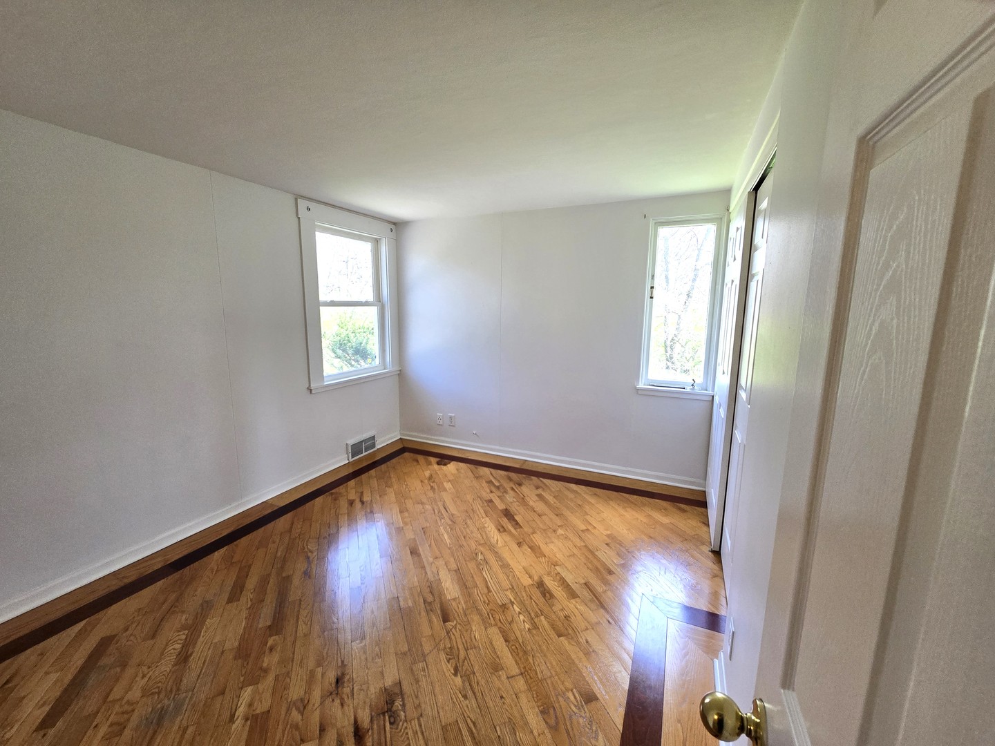 1316 South Fleming Road, Unit A Woodstock, IL 60098 - Photo 11 of 18 a view of an empty room and window