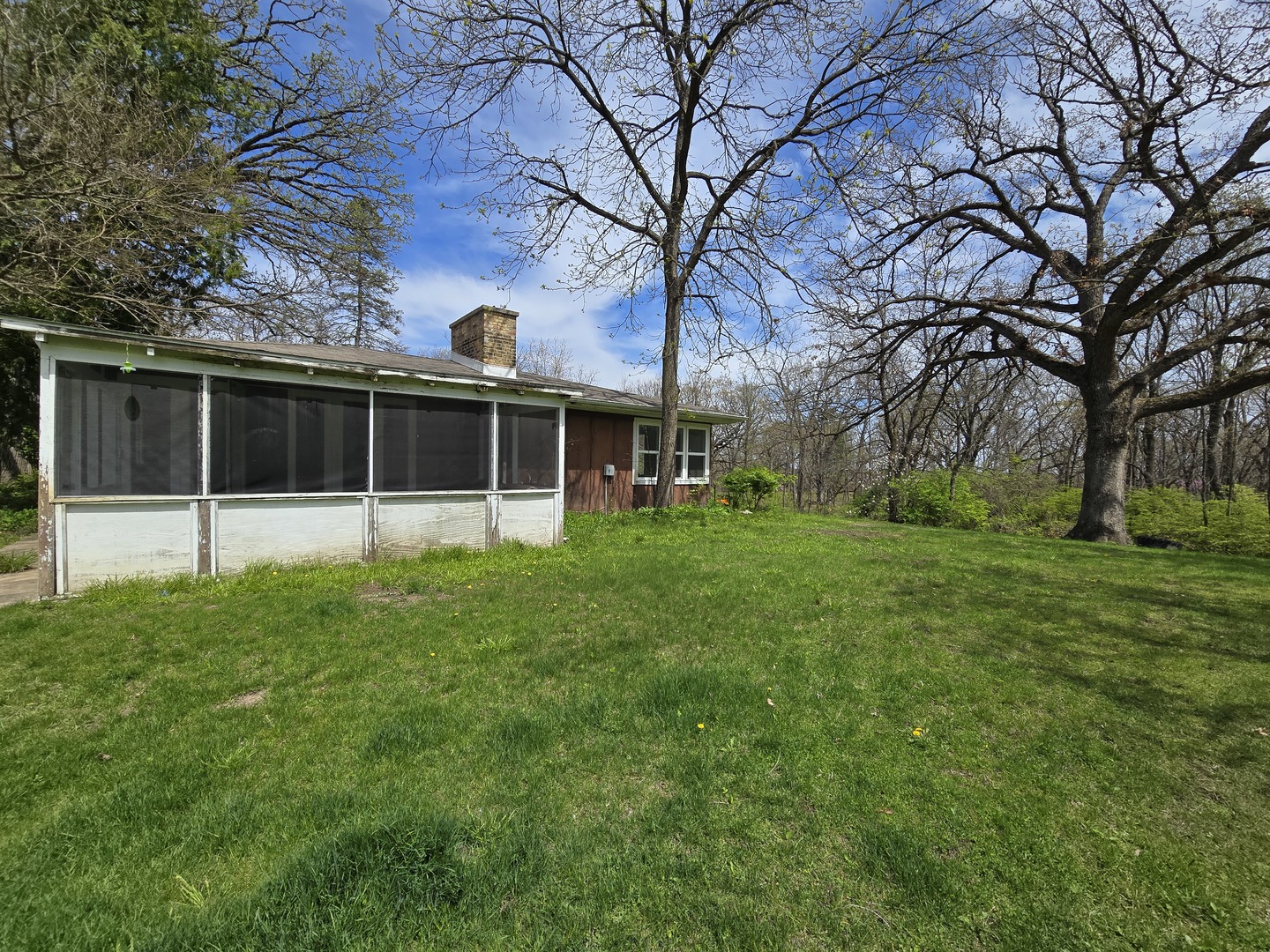 1316 South Fleming Road, Unit A Woodstock, IL 60098 - Photo 17 of 18 a view of an house with backyard space and garden