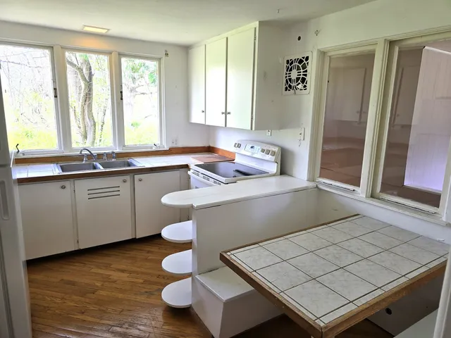 a room with furniture and window