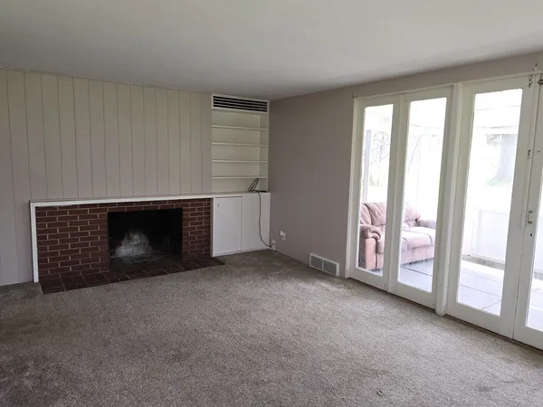 an empty room with windows