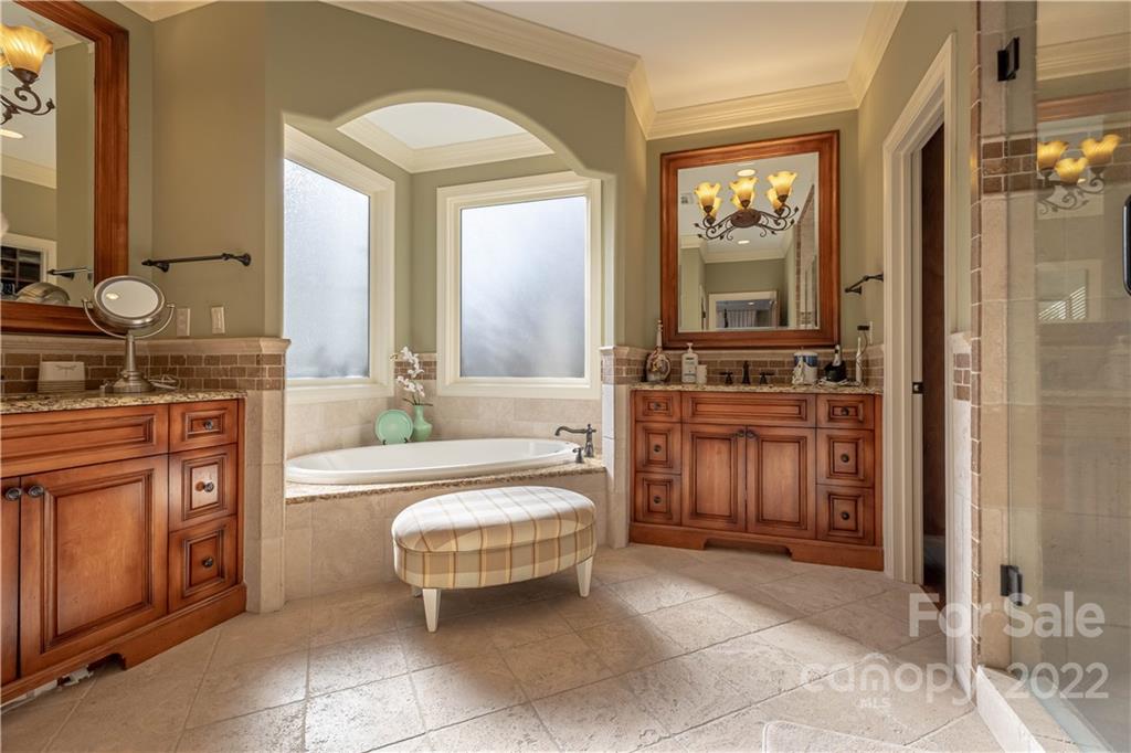 1849 Southpointe Drive Morganton, NC 28655 - Photo 14 of 48 a spacious bathroom with a tub sink and mirror