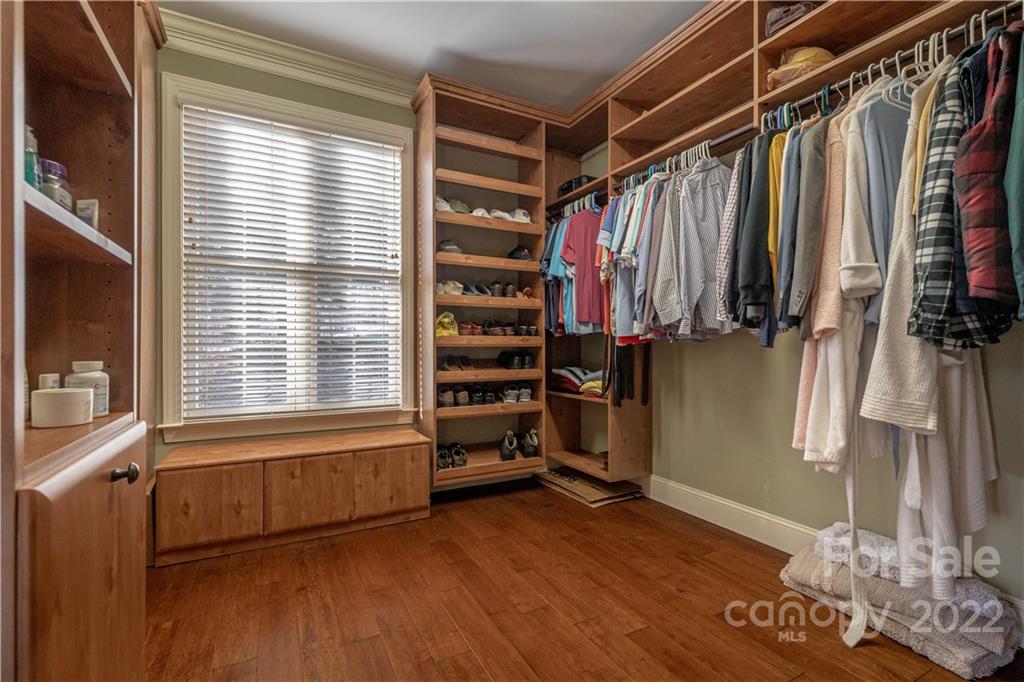 1849 Southpointe Drive Morganton, NC 28655 - Photo 16 of 48 a view of walk in closet with clothes and shoes