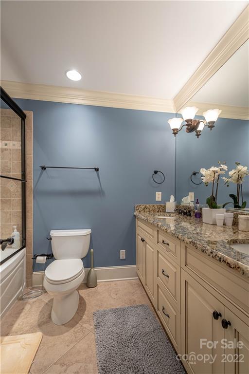 1849 Southpointe Drive Morganton, NC 28655 - Photo 22 of 48 a spacious bathroom with a double vanity sink toilet and a mirror