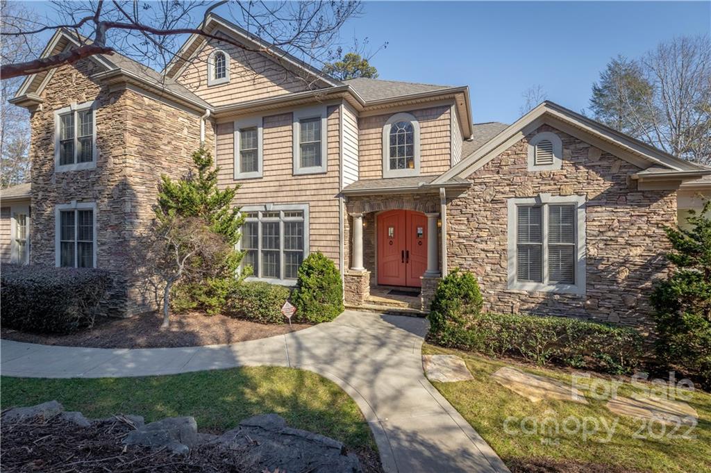 1849 Southpointe Drive Morganton, NC 28655 - Photo 3 of 48 a front view of a house with garden
