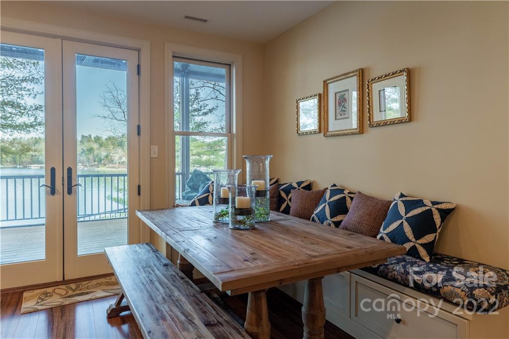 1849 Southpointe Drive Morganton, NC 28655 - Photo 31 of 48 a view of a dining room with furniture window and wooden floor