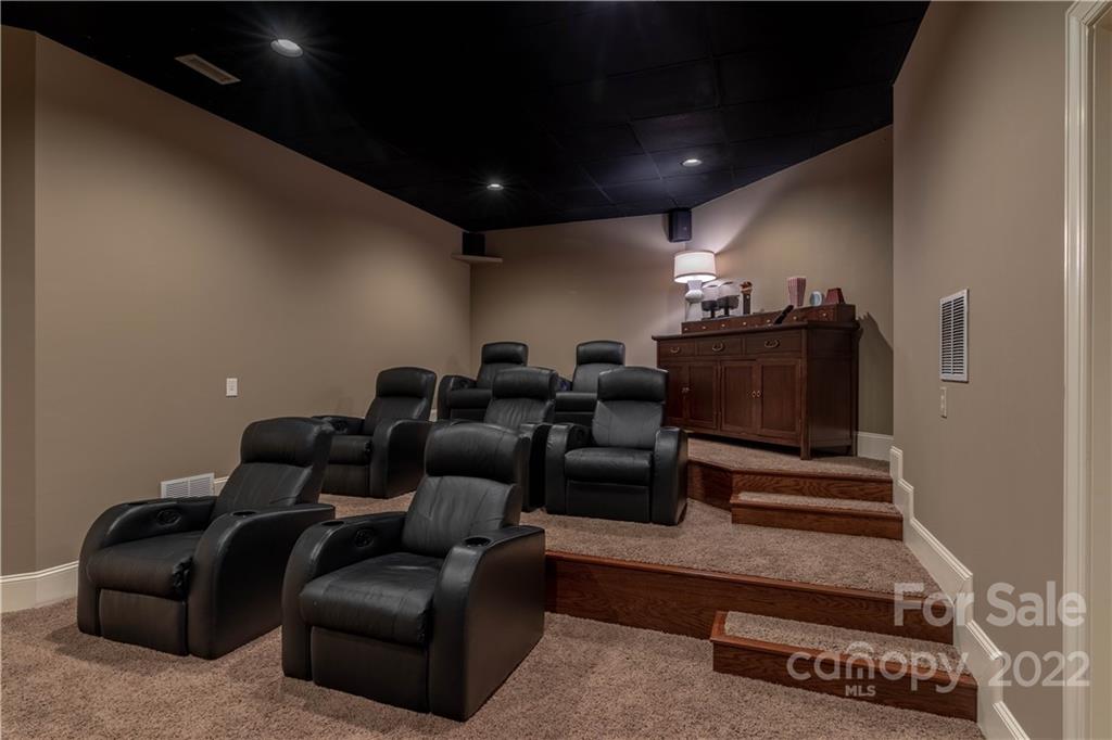 1849 Southpointe Drive Morganton, NC 28655 - Photo 33 of 48 a projector room with furniture