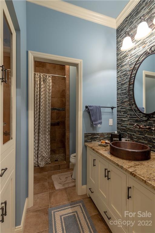 1849 Southpointe Drive Morganton, NC 28655 - Photo 36 of 48 a kitchen with a stove and a sink