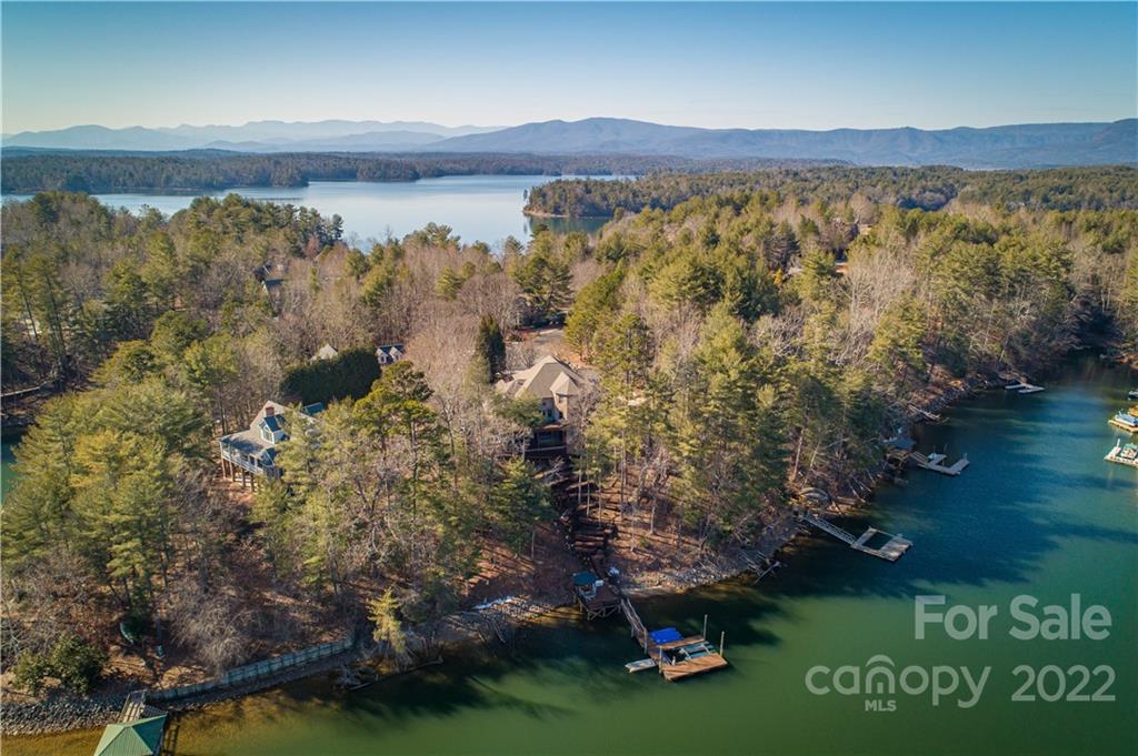 1849 Southpointe Drive Morganton, NC 28655 - Photo 47 of 48 a view of a lake with lawn chairs