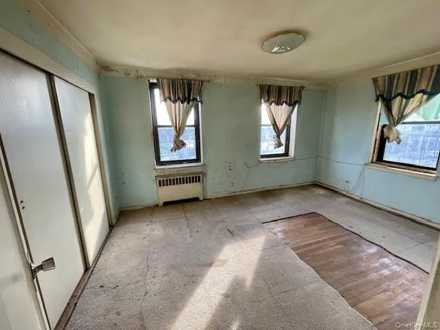 an empty room with windows
