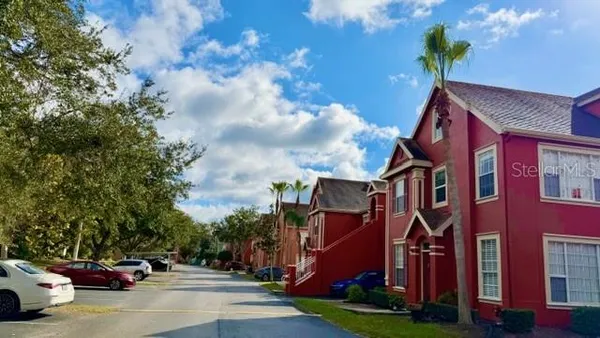 a cars parked in front of a house