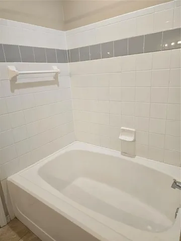a bathroom with a bathtub