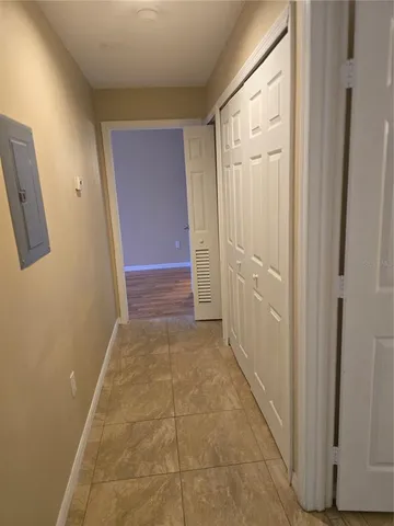 a bathroom with a granite countertop sink a toilet and bathtub
