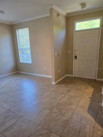 a view of an empty room and window