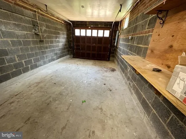 a view of a bathroom with a tub and a shower