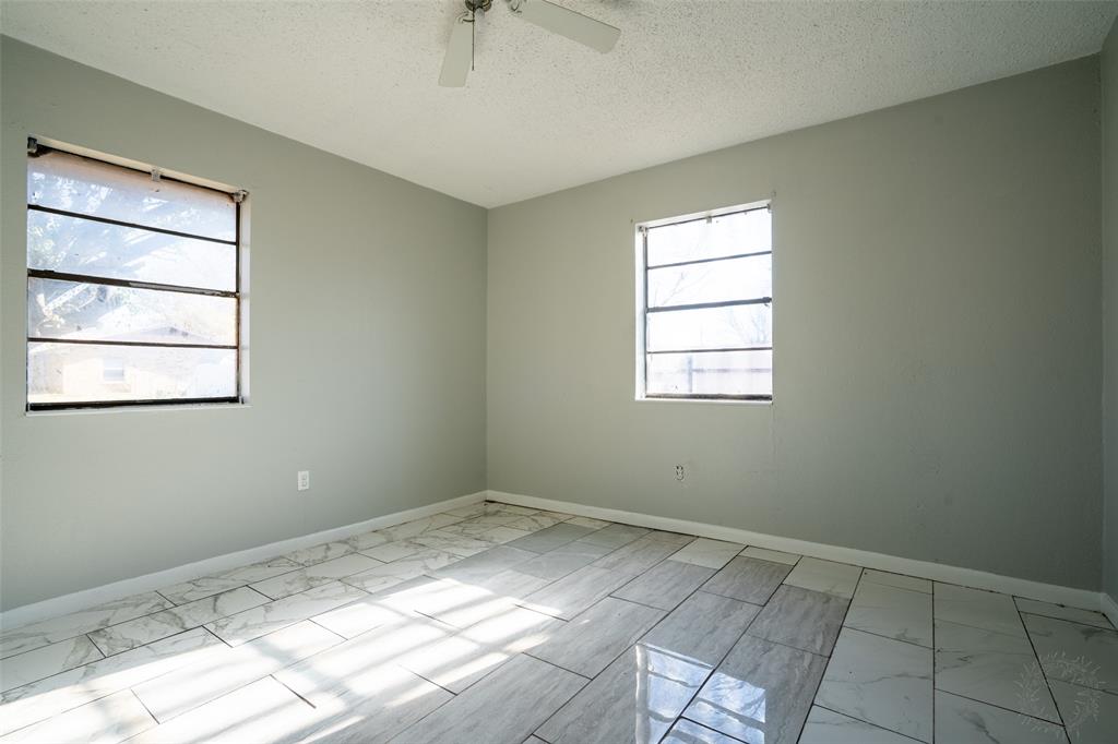 601 Henry Street Dublin, TX 76446 - Photo 24 of 40 a view of empty room with window