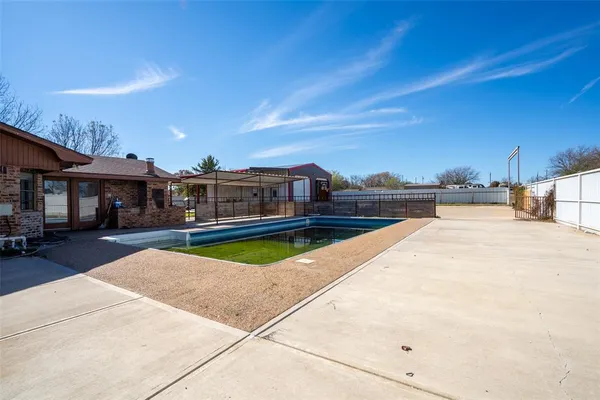 a backyard view of a house