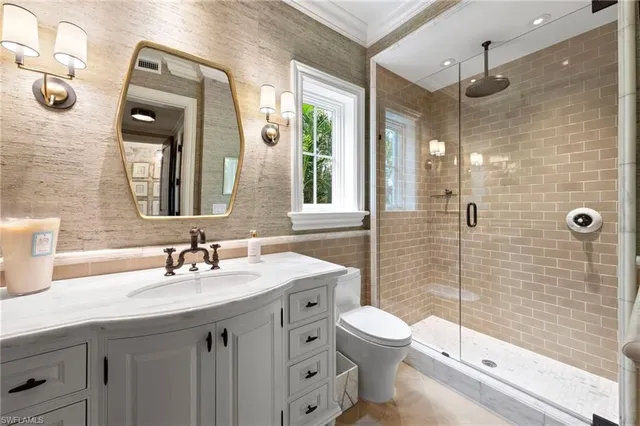 a bathroom with a bathtub sink and toilet