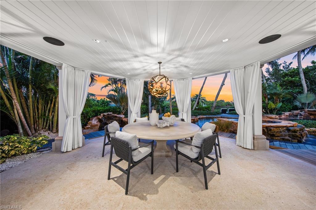 3675 Gordon Drive Naples, FL 34102 - Photo 36 of 50 a outdoor space with furniture