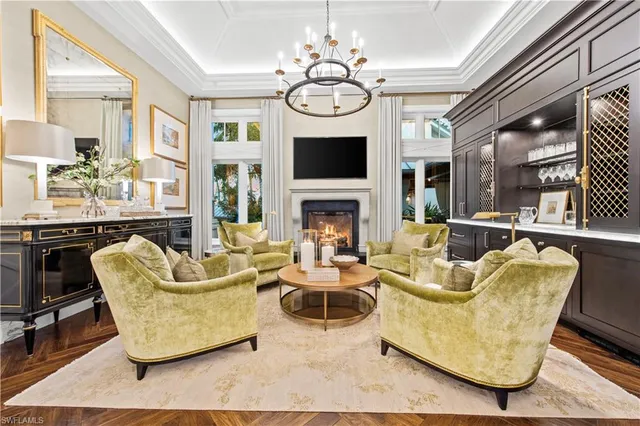 a swimming pool with outdoor seating and yard