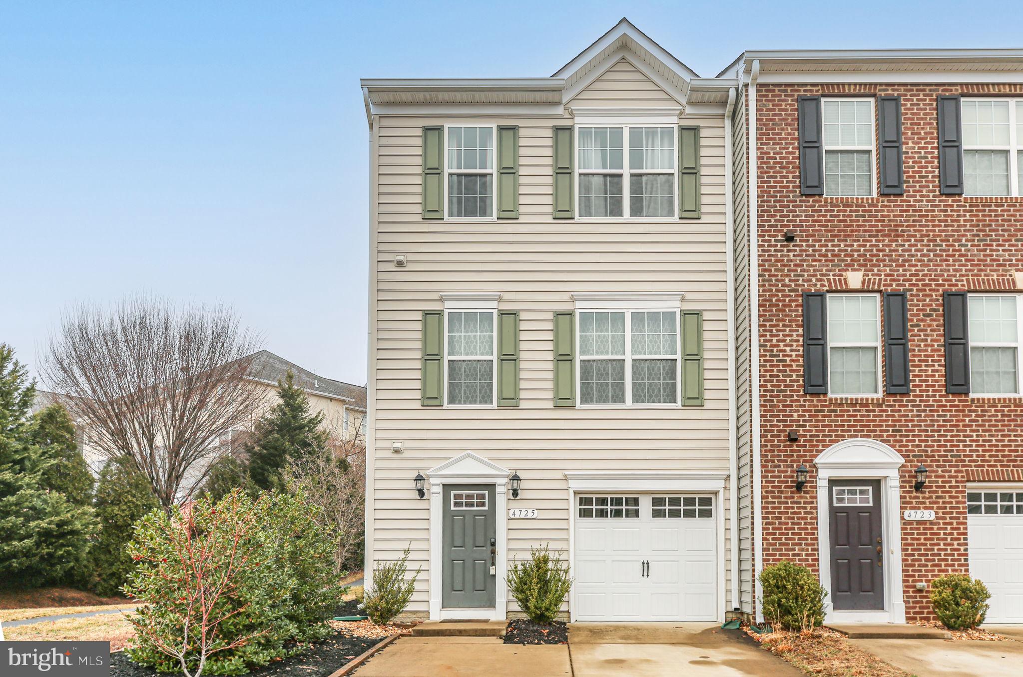 4725 Wensel Road Fredericksburg, VA 22408 - Photo 1 of 1 a front view of a house with a yard