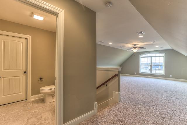 7 Bates Road Lebanon, TN 37087 - Photo 12 of 14 a bathroom with a toilet sink and a mirror