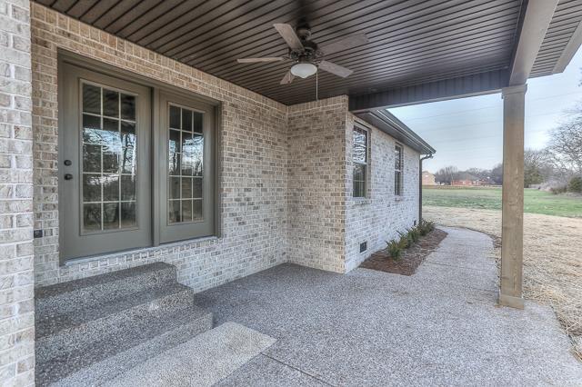 7 Bates Road Lebanon, TN 37087 - Photo 3 of 14 a view of a porch with wooden floor and garden