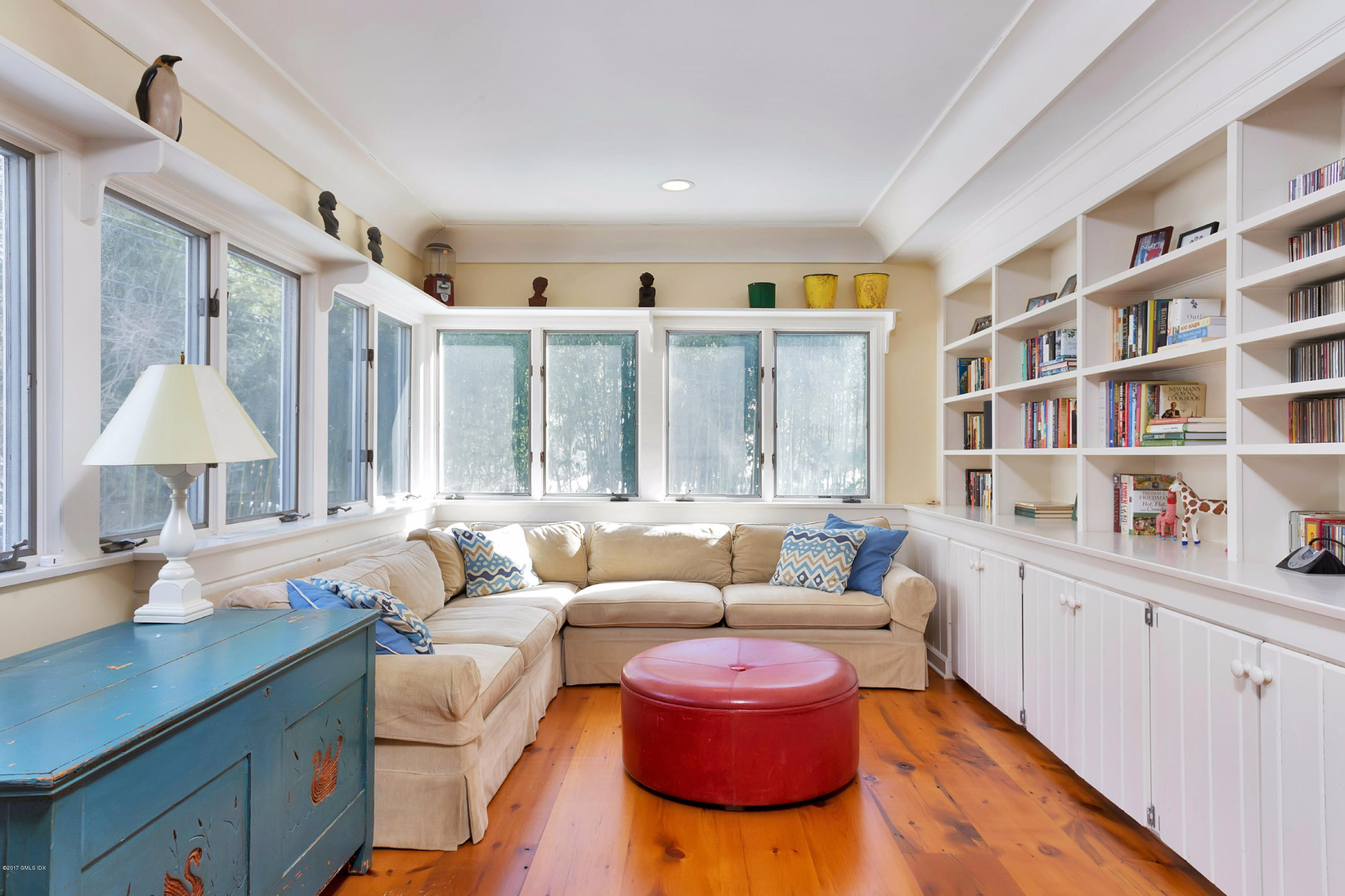 49 Gilliam Lane Riverside, CT 06878 - Photo 15 of 38 a living room with furniture and a lamp