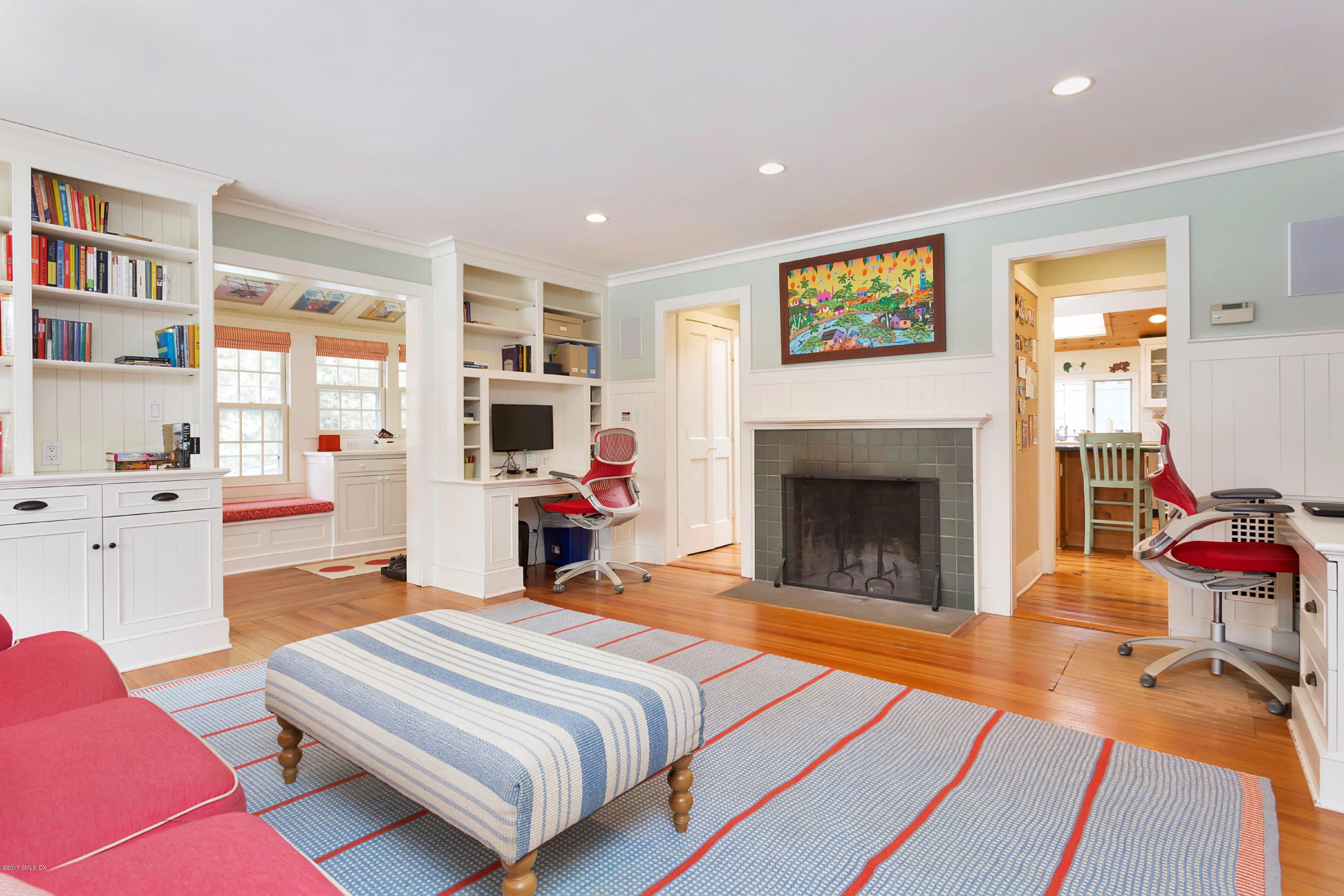 49 Gilliam Lane Riverside, CT 06878 - Photo 17 of 38 a spacious bedroom with a bed and a fireplace