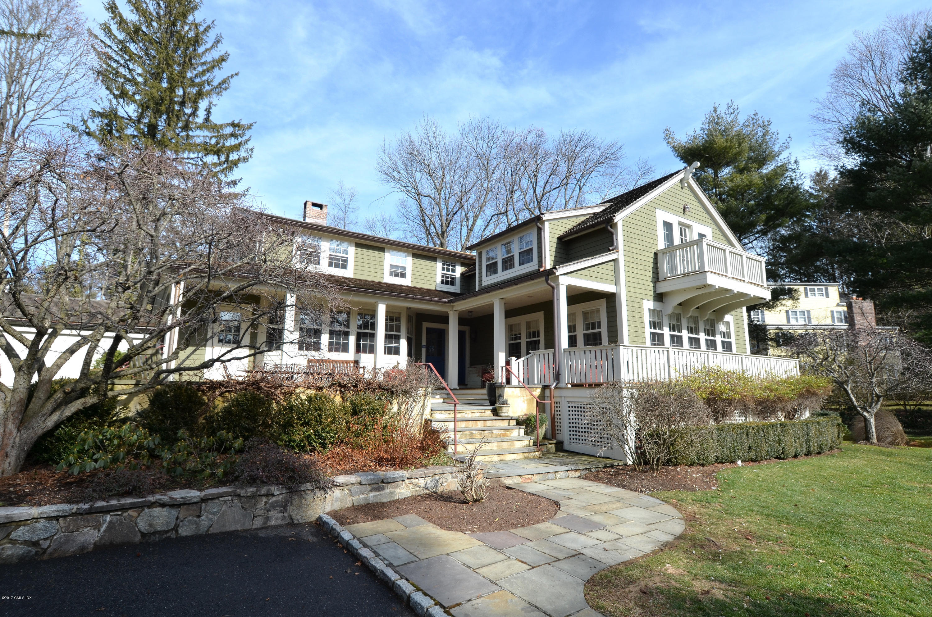 49 Gilliam Lane Riverside, CT 06878 - Photo 2 of 38 a front view of a house with garden