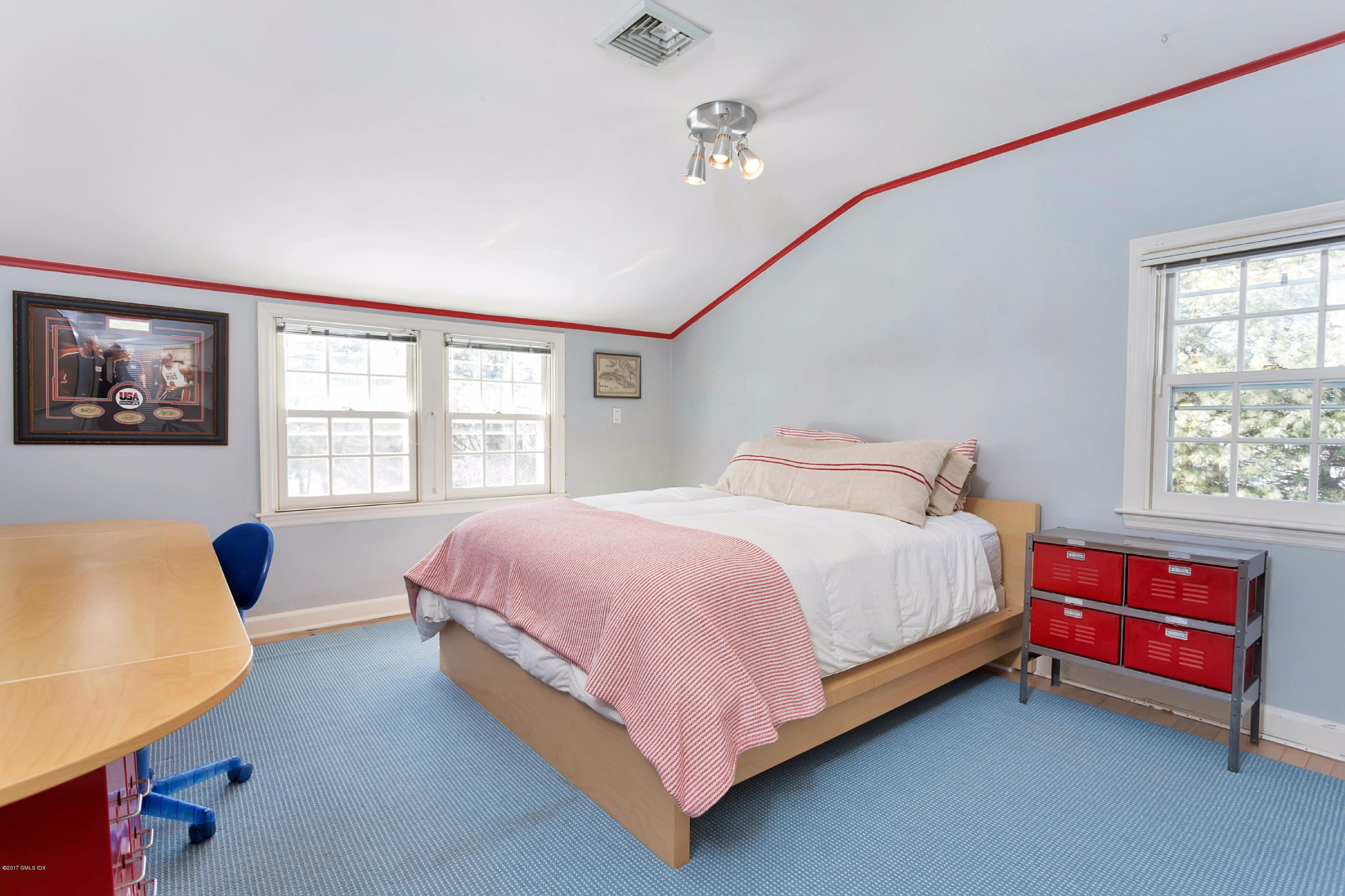 49 Gilliam Lane Riverside, CT 06878 - Photo 21 of 38 a bedroom with a bed and a couch