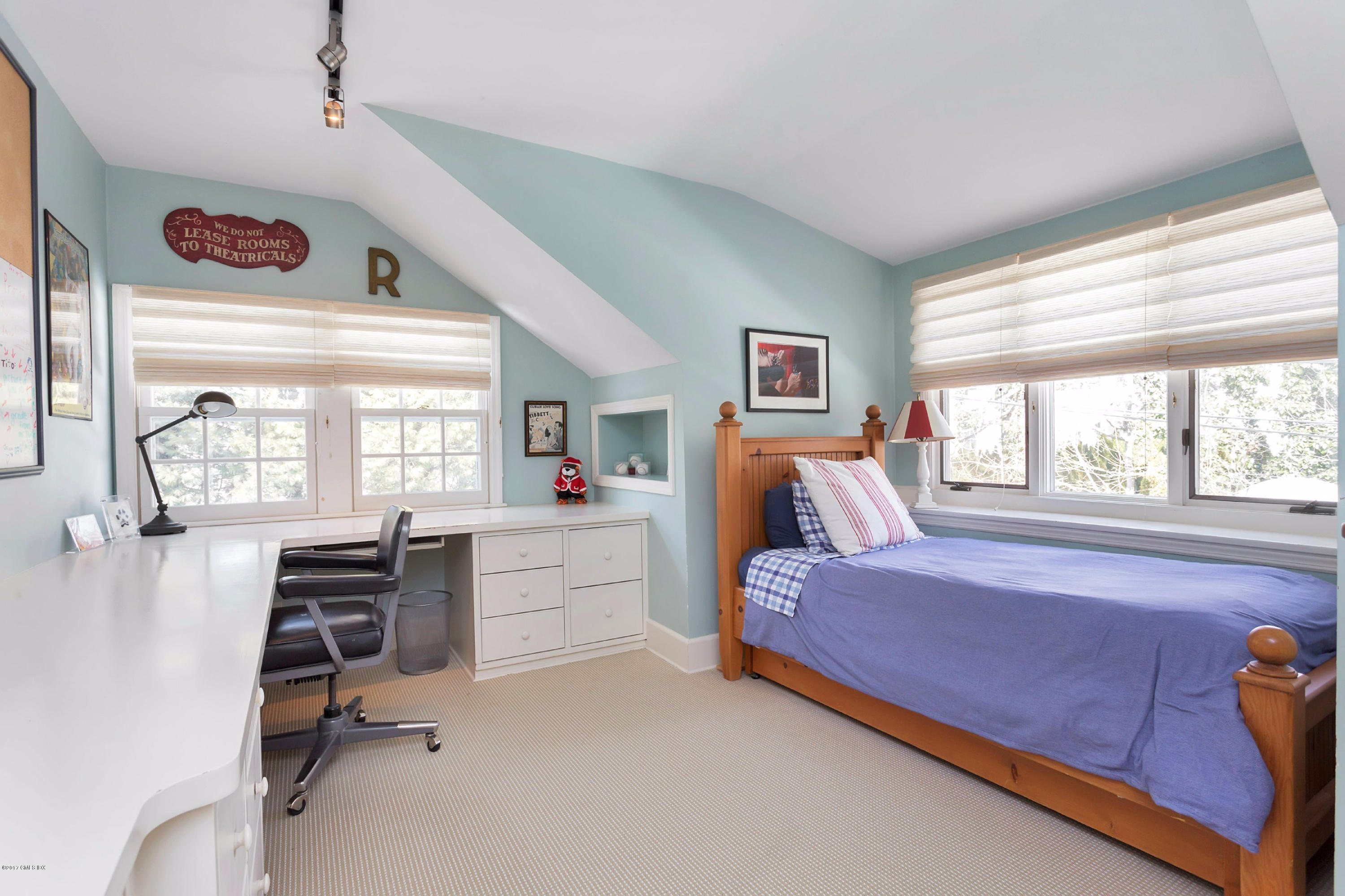 49 Gilliam Lane Riverside, CT 06878 - Photo 22 of 38 a bedroom with a bed and a large window