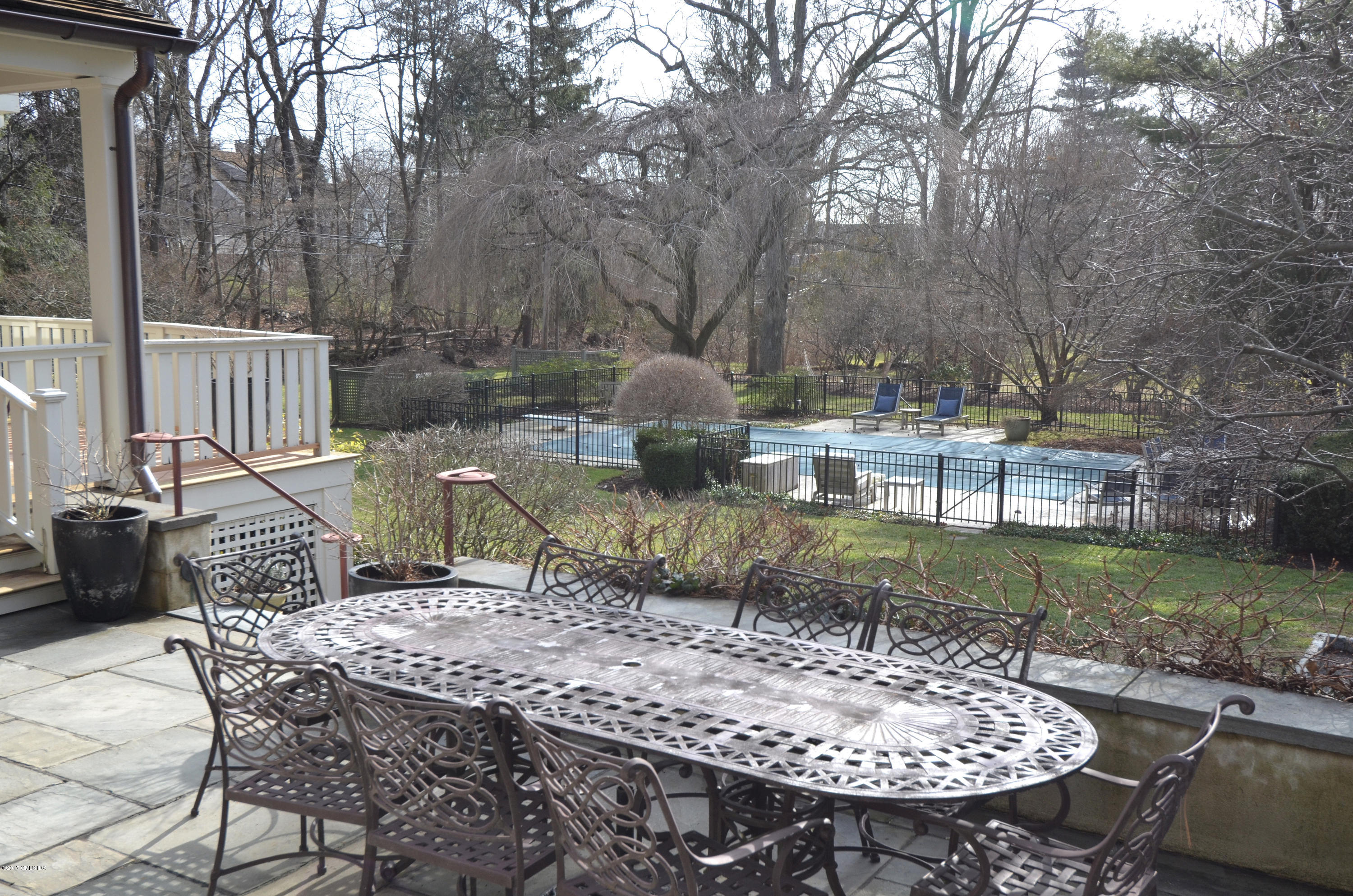 49 Gilliam Lane Riverside, CT 06878 - Photo 36 of 38 a view of a backyard with sitting area and furniture