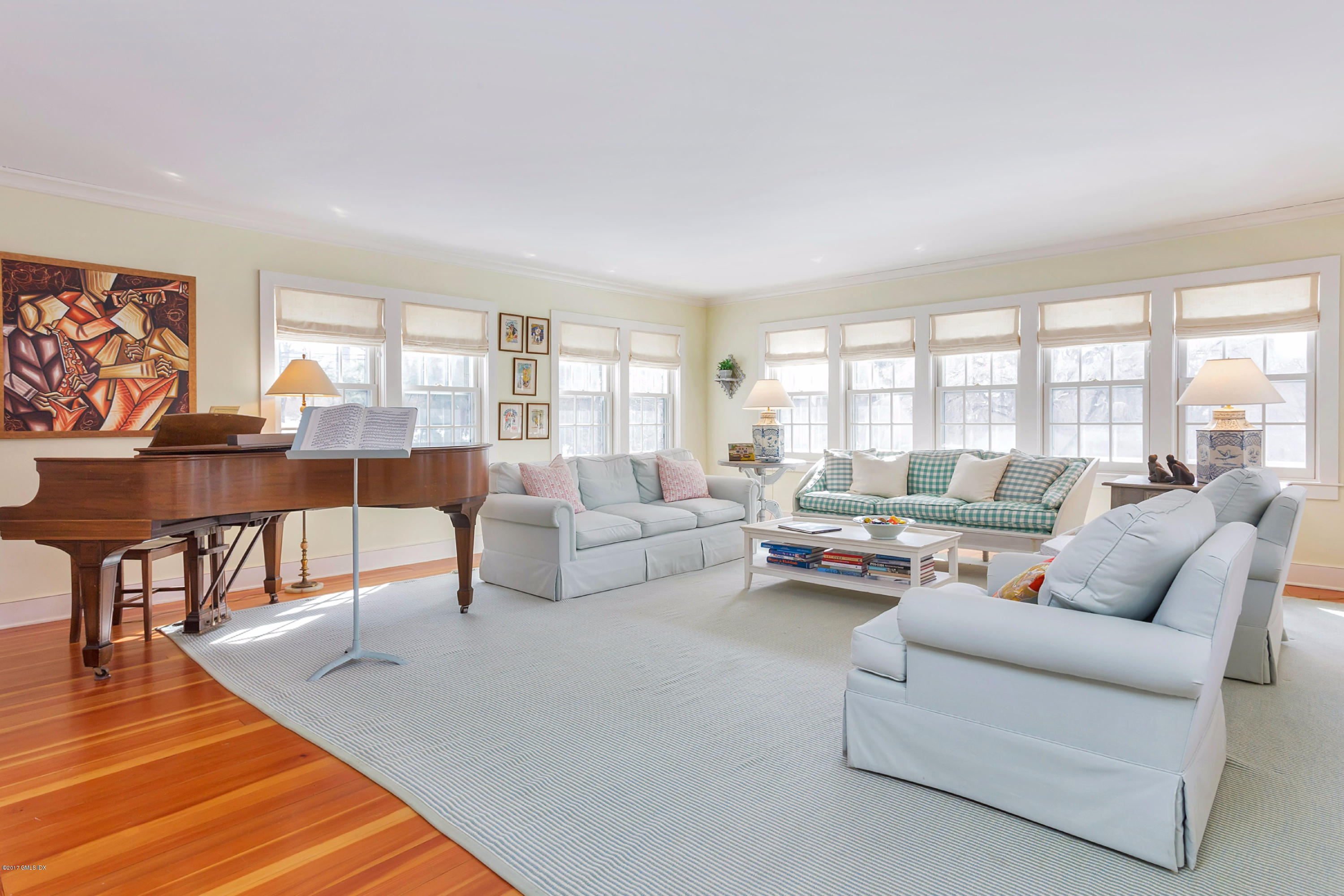 49 Gilliam Lane Riverside, CT 06878 - Photo 7 of 38 a living room with furniture and a large window
