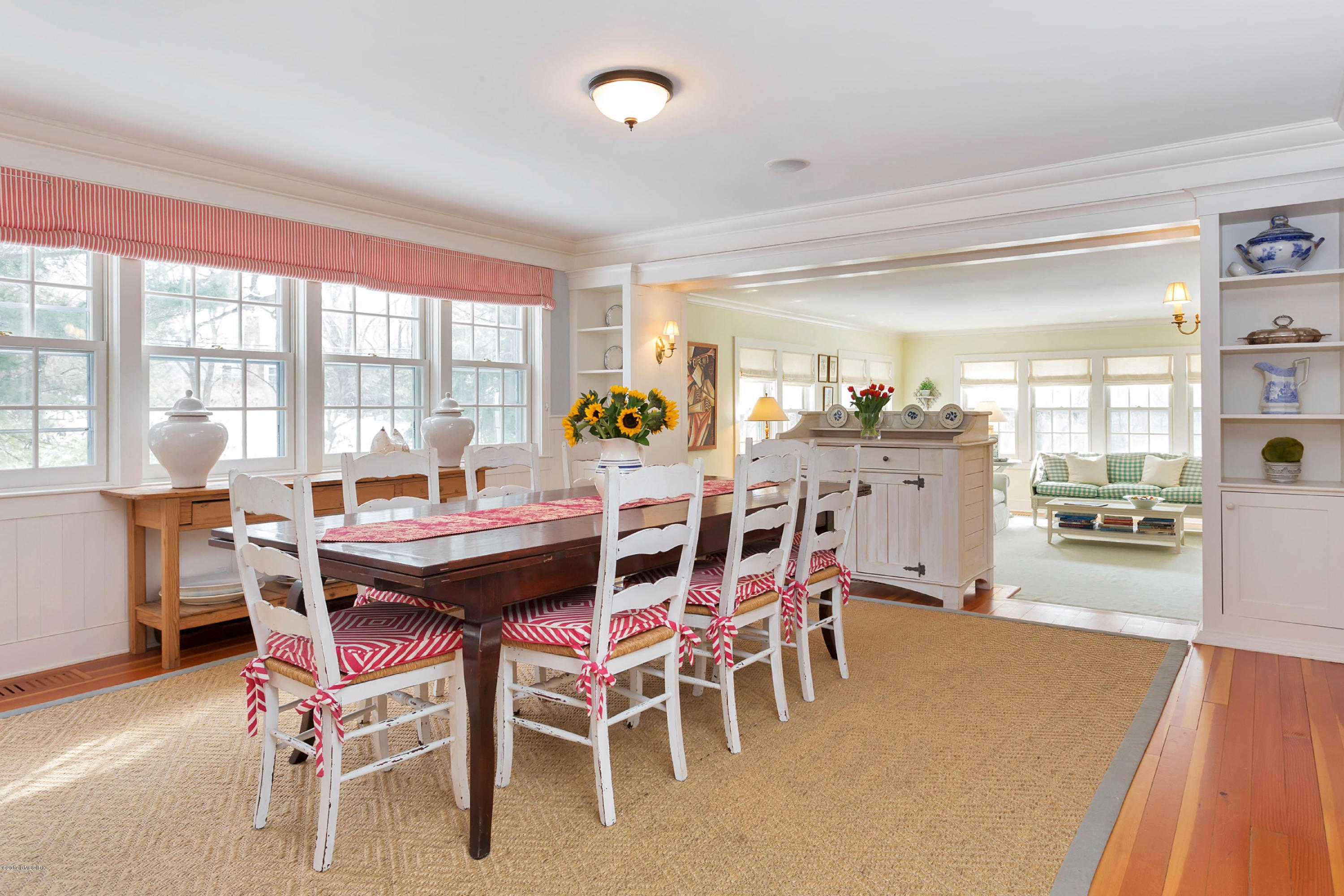 49 Gilliam Lane Riverside, CT 06878 - Photo 9 of 38 a view of a dining room with furniture and wooden floor