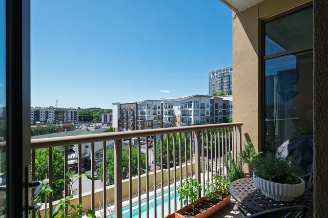 a view of a balcony with chair